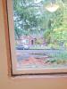 Once window trim is removed around window, any fibrous insulation is removed and the opening is brushed before installing canned foam or backer rod and caulk to air seal the rough openings