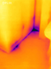 The dark areas in this IR camera image show air leakage coming up from the bottom plate along the wall. It is especially cold in the corner where the two exterior walls meet. 