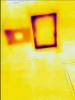 Wrong - IR image is showing that attic access is missing weather stripping.