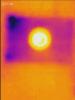 Wrong - IR image shows a lack of air-sealing and insulation around a ceiling light fixture.