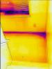 Wrong - This IR image is showing that cold air is entering the home at the window frame and the sill plate at the base of the wall.