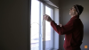Re-install the storm window panels, ensuring that the low-E coating is facing outwards.
