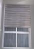 Install impact resistant shutters for windows not rated as impact resistant.