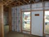 This hot climate zone home uses high quality batt insulation to insulate truss-joist headers. 