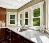 These interior storm windows have low-emissivity coatings to let in light while keeping out heat in the summer and keeping heat in in the winter 