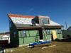 This roof is hurricane proofed with a coated insulated OSB deck sheathing that is caulked and taped at all seams with a water-resistant tape, then fully covered with a peel-and-stick membrane, and asphalt shingles.