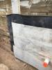 Right - The service penetration in the waterproofing membrane is well-sealed, and there is a drainage mat acting as a protective layer on the interior of the soldier piles and wood lagging. 