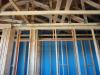 Wrong – No membrane or sealant is installed to air seal at the roof-truss assembly junction with the party walls 
