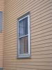 Exterior storm window