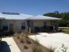 Manatee County Habitat for Humanity built this affordable home in the hot-humid climate in Bradenton, FL, and certified it to DOE Zero Energy Ready Home specifications in 2013. 