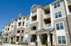 Fresh air intakes and exhaust vents are ducted to each unit in this multifamily building