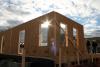 Structural insulated panels provide a continuous layer of insulation sandwiched between two continuous layers of OSB for thermal protection and sturdy construction.