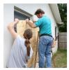 Right - Panels of 7/16-inch treated plywood are inexpensive but take time to install and are difficult to install on higher windows.