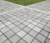 Porous surfaces like pavers allow water to pass through and percolate slowly into the soil 