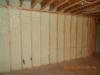 To ensure a complete air barrier between the garage and the house, the wall between the garage and the house was insulated and air-sealed with four inches of high-density spray foam.