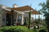 These removeable awnings provide ample shade to windows and patio space, reducing heat gain to the home.