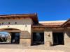 Right –  Deep overhangs, pergolas, and covered entryways minimize heat gain in this commercial building in the hot-dry climate.