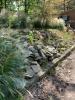 Riprap is placed on a hillside to stabilize the ground and reduce erosion