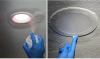 After spraying on foaming glass cleaner, smooth the caulk with a gloved finger to get a neat, even finish 
