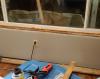 Canned spray foam can be used to air seal the rough opening around the windows