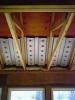 Baffles provide an air space over the insulation to guide ventilation air from the soffit vents up along the underside of the roof deck