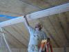 Use a smoke pencil to check for air leaks at SIP panel seams, especially along the ridge beam