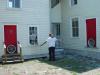 A home is tested at two points for enclosure air leakage