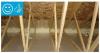 Right - Spray foam insulation air-seals the ceiling-to-drywall seams at the wall top plate.