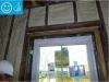 Right - New flashing has been installed to complete the air and water control layers at the window openings of this wall retrofit that includes insulating the wall cavities with spray foam
