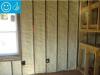 Right - Closed-cell spray foam insulation fills the wall cavities of the exterior walls in this home retrofit