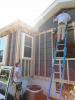 Windows are installed in new framing in preparation for adding exterior spray foam insulation