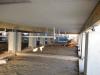 The application of intumescent coating/protection layer protects this elevated floor system from below.