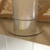 This is a take-off collar for connecting a round metal duct to a flat sheet metal trunk duct. 