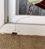 Pouring water into the window track and checking for drainage at the weep holes can reveal if weep holes are draining properly.