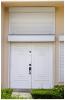 Right - This door and window have a permanent protective covering system.
