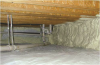 Right - Spray foam insulates and air-seals the stone walls of this unvented crawlspace.