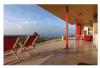 Right - Use flood-damage-resistant materials for decks and portions of the house below the design flood elevation.