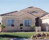 A typical Las Vegas hot-dry climate home uses stucco siding and a tile roof. 