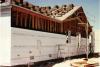 A typical Las Vegas hot-dry climate home made of wood frame construction and insulated with R-25 expanded polystyrene externally over a drainage plane, with an unvented wood frame insulated attic and roof assembly. 