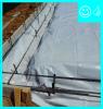 Right – Polyethylene sheeting is laid over aggregate and over footing to provide a capillary break between the ground and the slab and between the footing and the stem wall