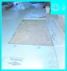 Right - This rigid insulation is correctly installed in a level layer over aggregate; the seams will be taped