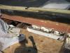 Closed-cell spray foam fills the roof joist cavities forming an air barrier between the masonry parapet wall and the roof sheathing
