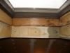 Water stains on the framing indicate water infiltration at the skylight