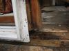 Wrong: Heavy rot has occurred because this window had no flashing and moisture was able to leak behind the siding and stain the framing.