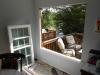 A new high-performance window will be installed in the rough opening of this existing home
