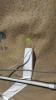 Wrong - Tape is not well adhered to house wrap and wiring penetration is not sealed.