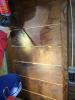 Right - Wood board sheathing seams are being sealed with low-expanding spray foam.