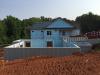 The daylight basement walls are made of concrete walls with integrated rigid foam and steel-faced concrete studs.