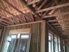 Baffles will keep insulation out of the soffit vents and wind out of the insulation in this vented attic.