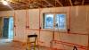 Wiring runs are covered with canned spray foam to maintain the continuous foam layer that covers the inside and outside of these ICF block walls.